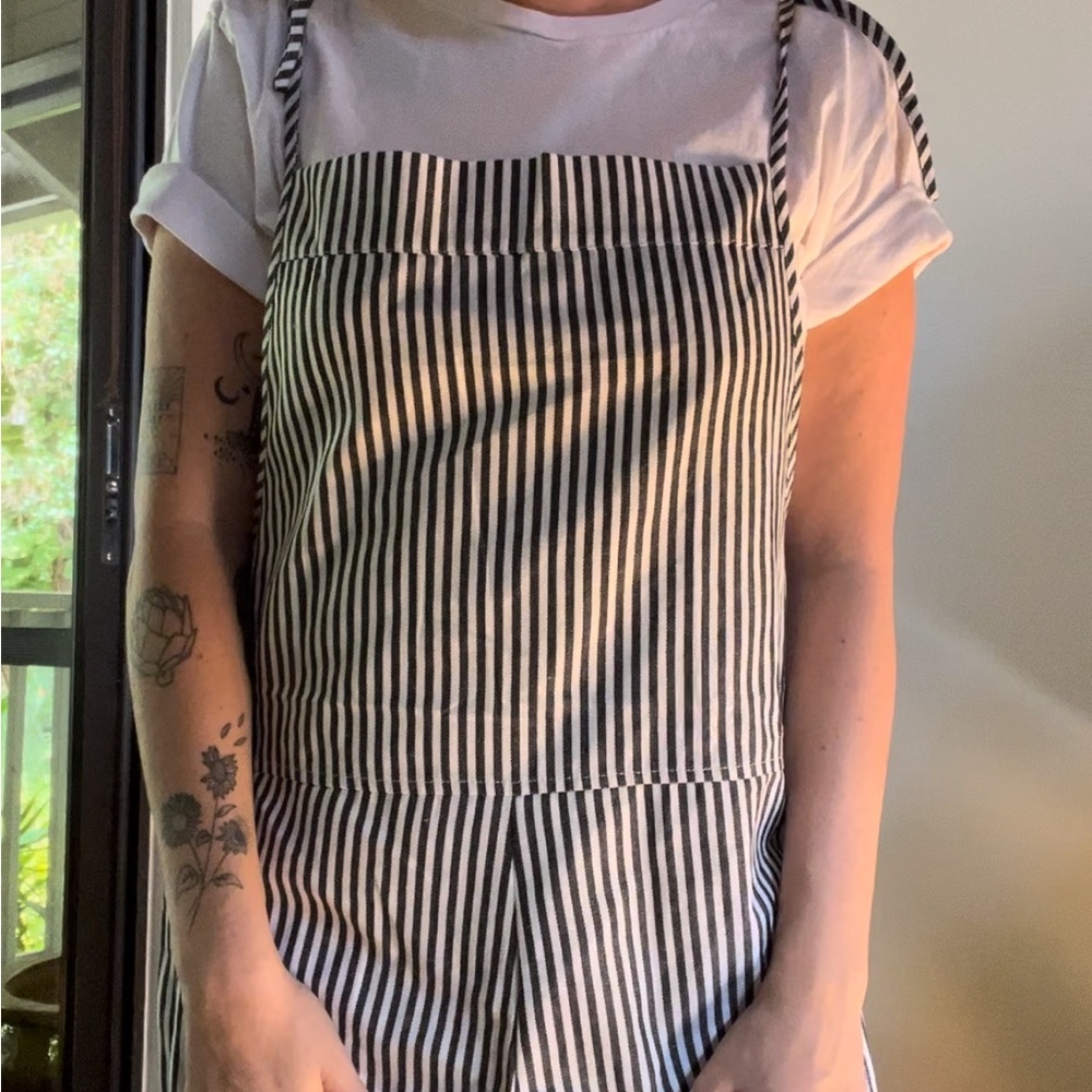 Cute, easy romper. Pinstripes, blue/gray and white.